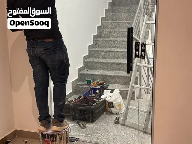 ترکیب وصيانة ابواب اتوماتيك و مكانيكي الزجاجي و