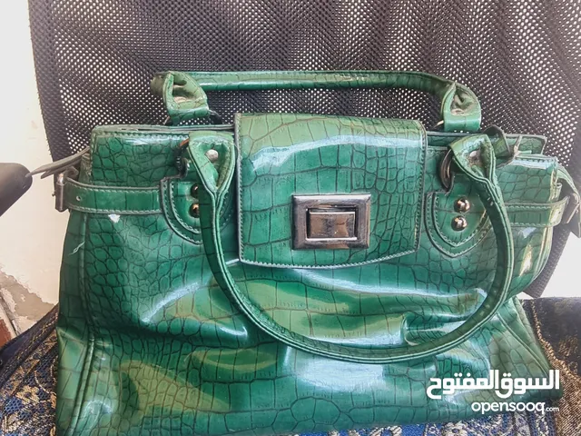 شنطة كتف اخضر زيتي