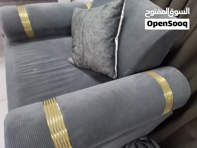 grey single sofa with pillow, new