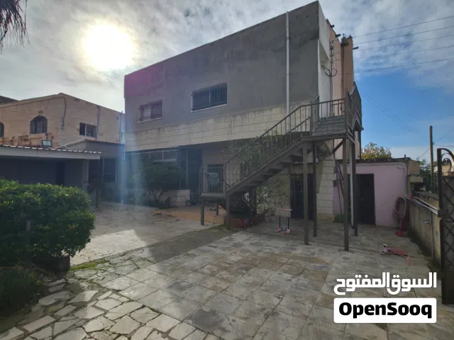 قطعة ارض تجاري مع منزل مستقل للبيع