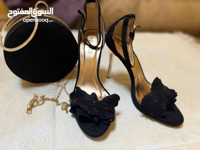 Black With Heels in Tripoli