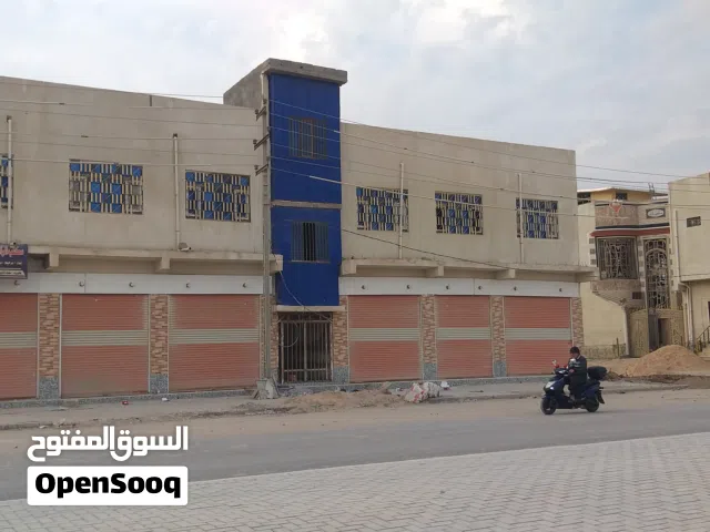 عمارة محلات تجارية وشقق