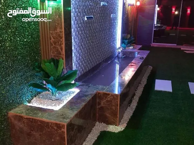 بناء شلالات الصناعيه ونوافير وبرك سباحه
