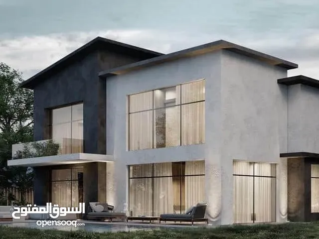 تاون هاوس للبيع 210 م فيو علي لاند سكيب موقع متميز علي طريق السويس بالقرب من الرحاب و مطار القاهره