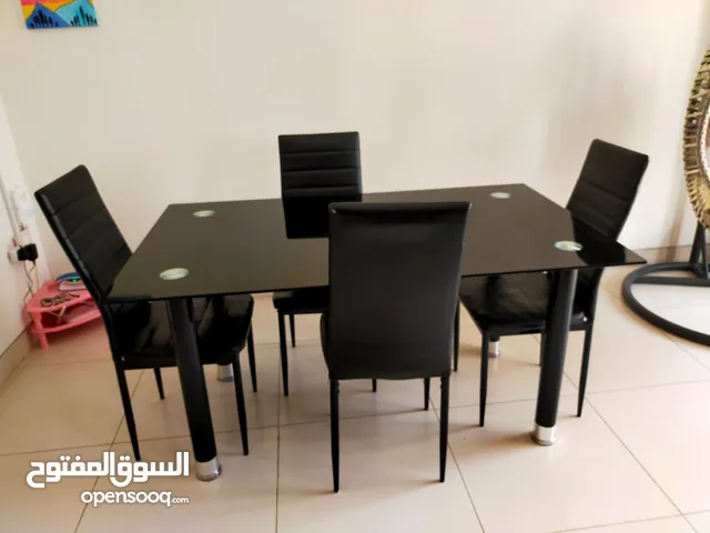 urgent sale pan emirates dining table with 5 chairs