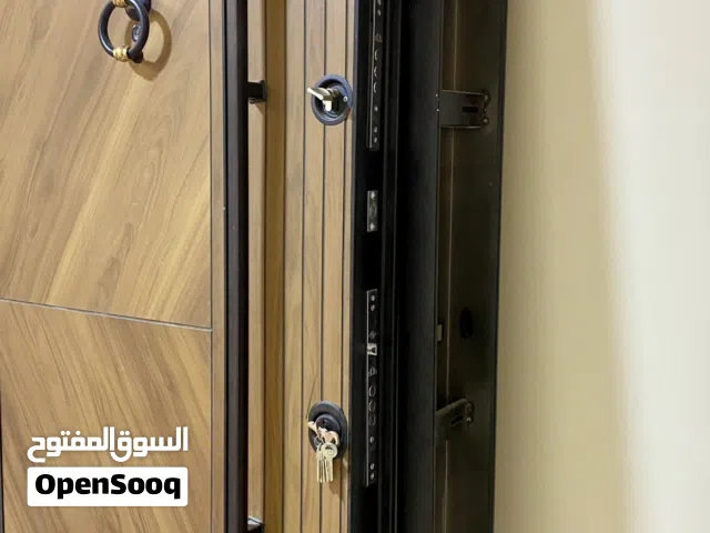 باب مصفح يجمع بين الأمان والشكل الراقي والأنيق والراحة النفسية