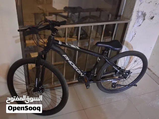 بسكليت جبلي PHOEQN قياس 26 نظيف جداً (بحالة الوكالة) مع كامل إضافاته للبيع