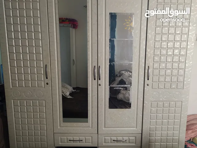white 4-doors wardrobe 75omr Alhail