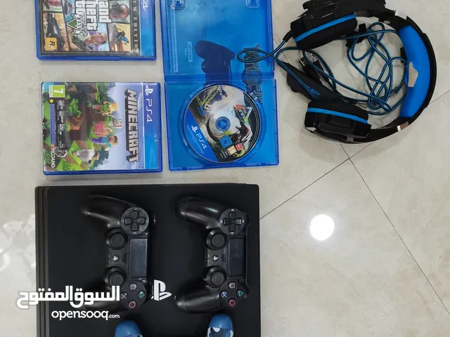 PS4 PRO with 3 controllers and 6 games and headset