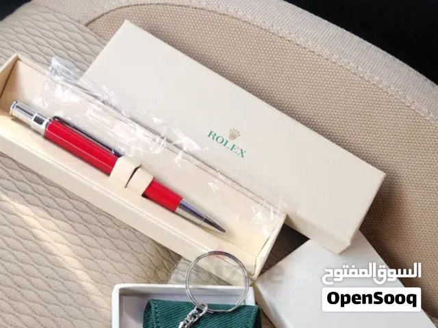 قلم وعلاقة مفاتيح من رولكس اصليات