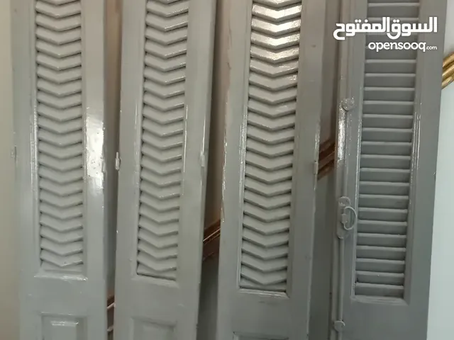 شيش بلكونه خشب زان مدهون حالته كالجديد