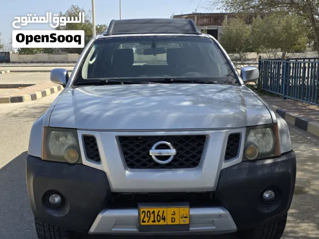 نيسان X-تيرا 2012 مستعملة بحالة ممتازة، لون رمادي، أسود داخلي، بسعة محرك 4000-4999 سي سي، مرخصة وبحا