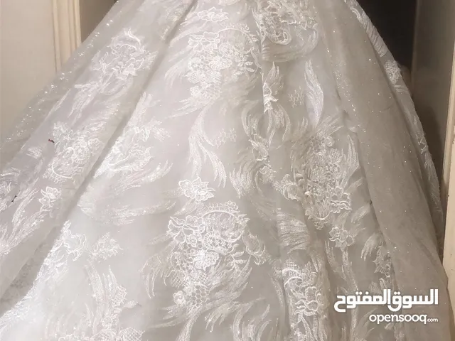 بدلة عروس ابيض