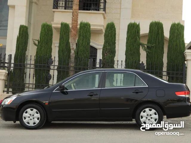هوندا اكورد 2003 محرك 2000 سي سي ترخيص قليل وارد وكاله لون اسود بحاله ممتازه اتماتيك لا تحتاج إلى شي
