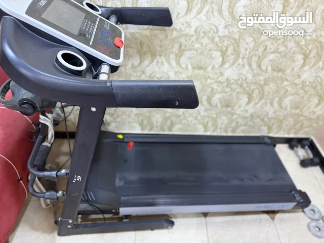 جهاز سير مستعمل بالإضافة إلى جهاز تدليك معه