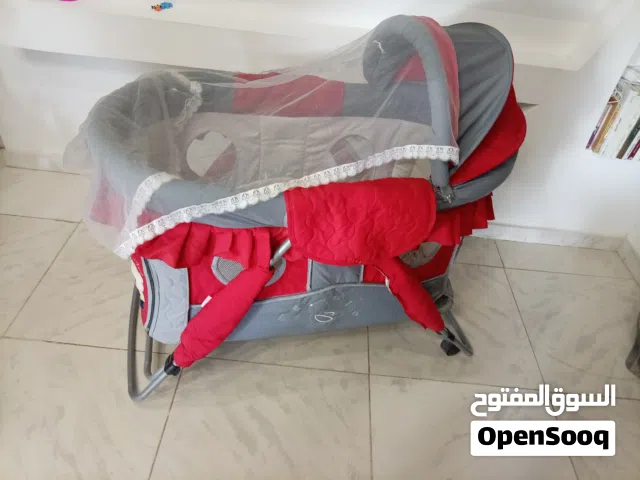 بسكليت جنط 26 غيارات وسرير أطفال ثني رائع ومقعد نونو أطفال وعرباية أطفال شبه جديد
