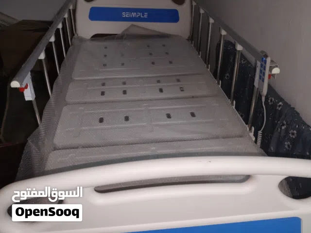 سرير طبي كهربائي