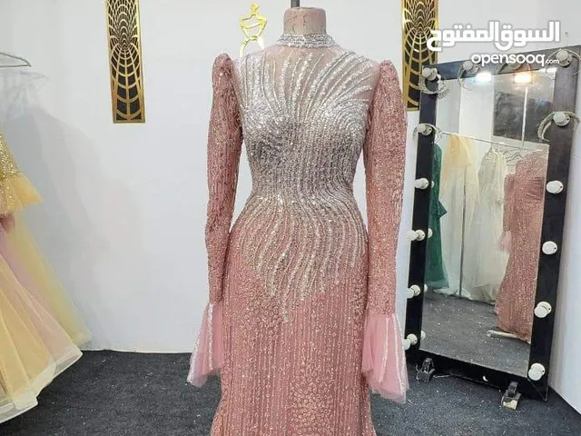 فساتين زفاف وسواريه