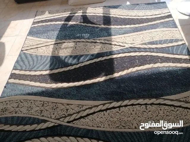 سجاده جميله وثقله لون بيج وتركواز وكحلي