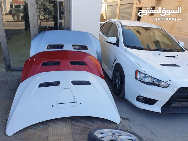 غطاء مُحرك Mitsubishi Evo X أصلي مُستعمل + جديد بسعر مناسب