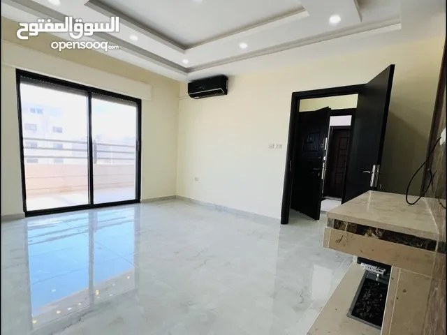 شقة جديدة للبيع ب حي المنصور طابق ثاني 170 متر مطله على شارع ياجوز وشارع الأردن راكب مطبخ ومكيفات