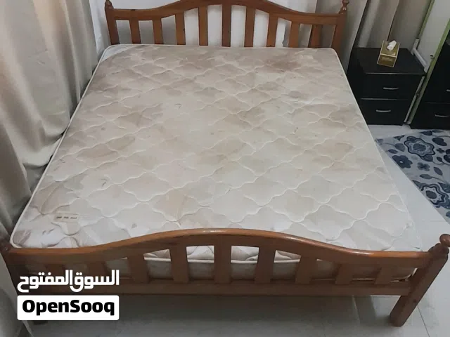 Wooden bed and metres