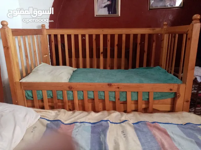 سرير طفل مقاس كبير