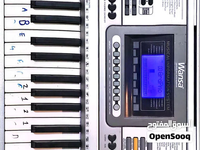 لوحة مفاتيح موسيقية إلكترونية من ماركة Wansa، طراز MK-810.