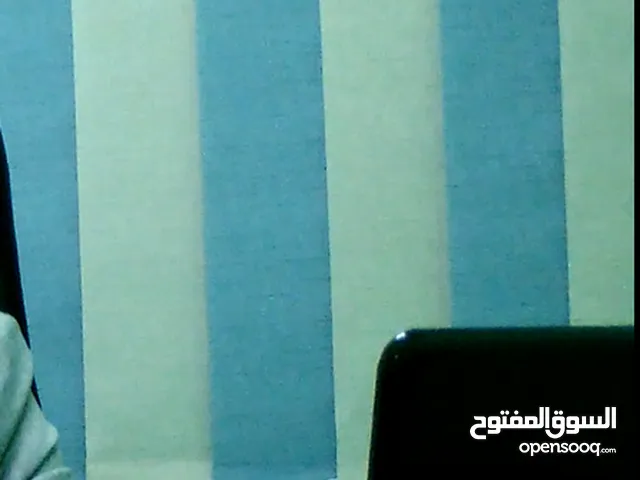 ستائر شرائح راسية مكتبية لشبابيك اخضر وبيج استخدام شهر واحد كالجديد