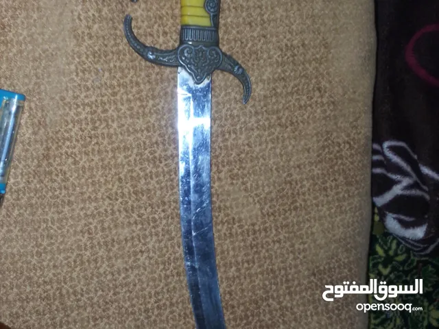 سيف زخرفي جميل على الطراز الآسيوي بميتين دولار