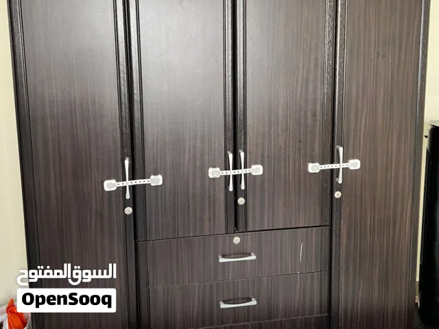 Spacious 4-Door Wooden Wardrobe with 3 Drawers – Excellent Condition!