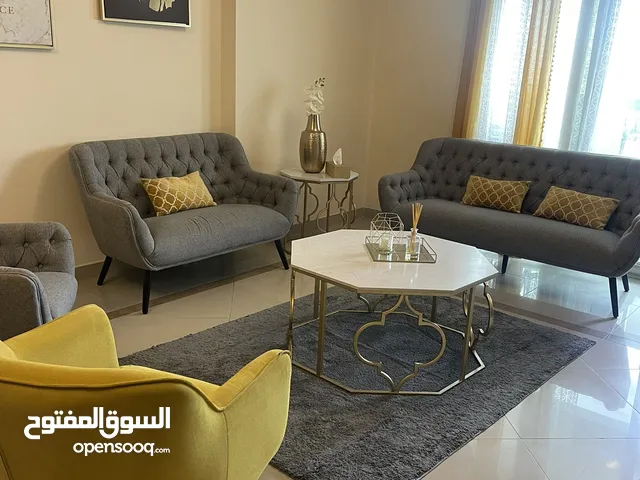 Living room with middle tables غرفة جلوس مع طاولات