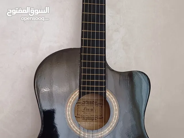 Fitness classic guitar Brand new condition with a bag and a 0.81mm pick كلاسيك جيتار جديد غير مست