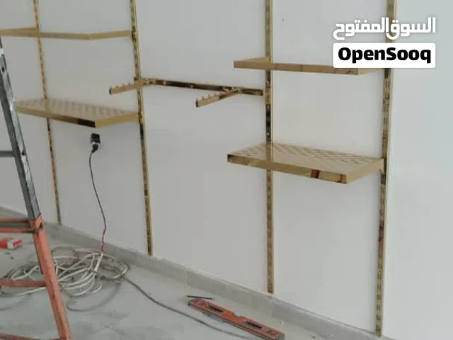 ستاند ملابس ذهبي