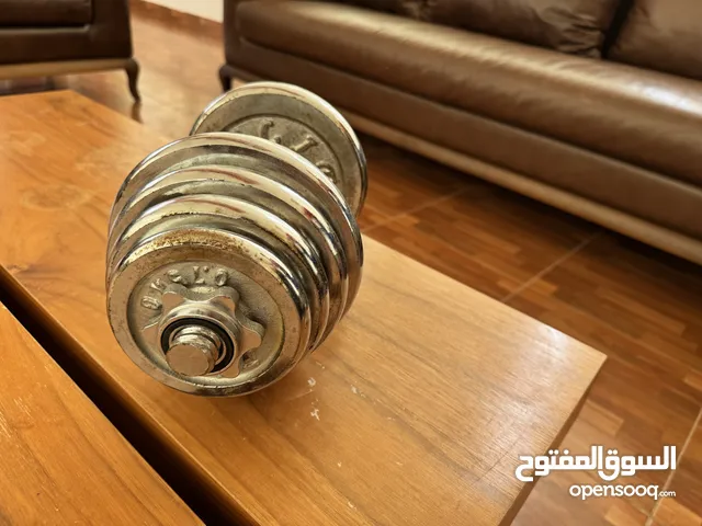 كرسي حديد مائل/مستوي + عدد 2 دنابل + حقيبة أوزان و مكملتها تصنيع شركة يورك +حقيبة ملاكمه و مكملتها.