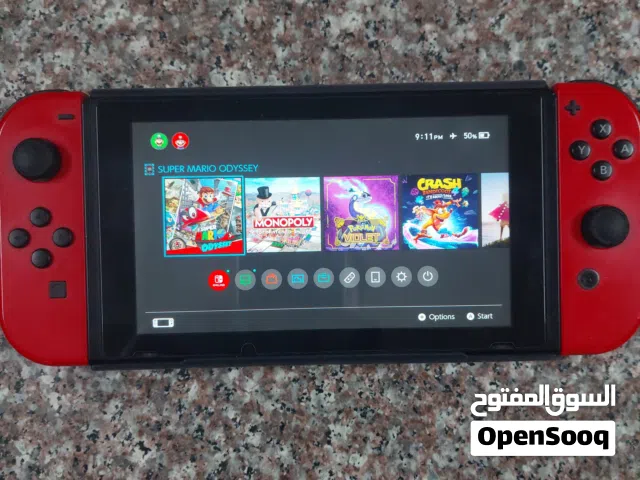 ننتندو سويتش مع 5 اشرطة واغراضها كاملة