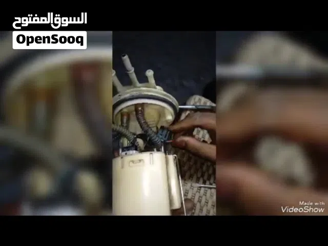 ميكانيكى  سيارات العين السخنه   بطارية طلمبه بنزين سيور كوع مياه