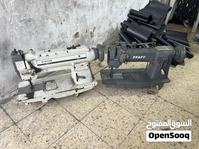 ماكينه سنجر جر مشترك للتنجيد والحقائب بحاله ممتازه ما شاء الله