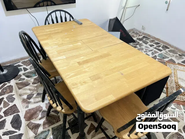 طاولة سفرة مع 4 كراسي خشب