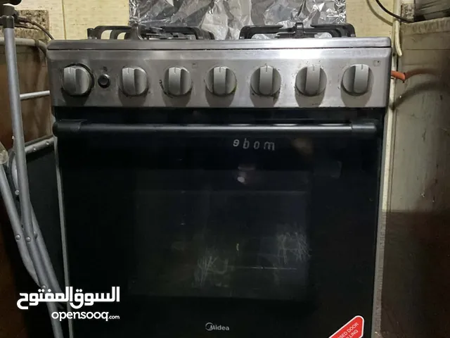 Midea cooker with rotisserie بوتجاز بشواية