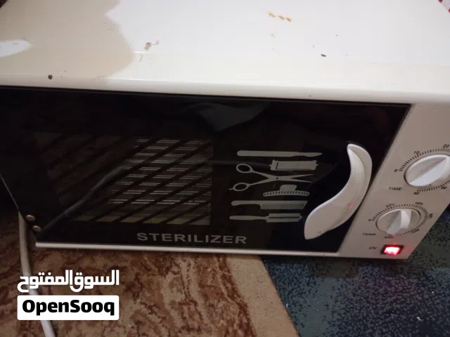 جهاز لتعقيم ادوات الحلاقه