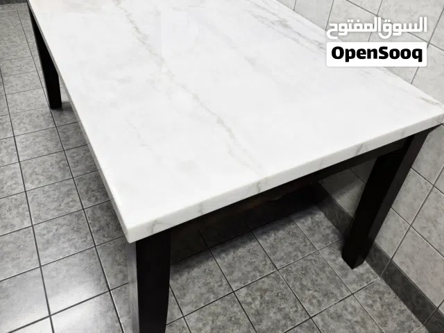 طاولة طعام رخام بحالة ممتازة جدا - Marble dining table in excellent condition