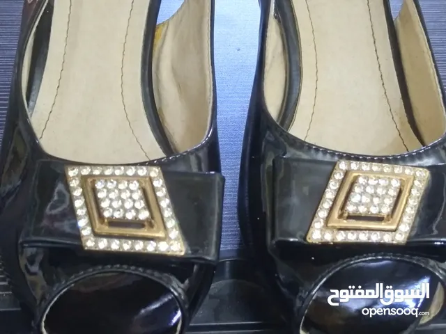 Other With Heels in Basra
