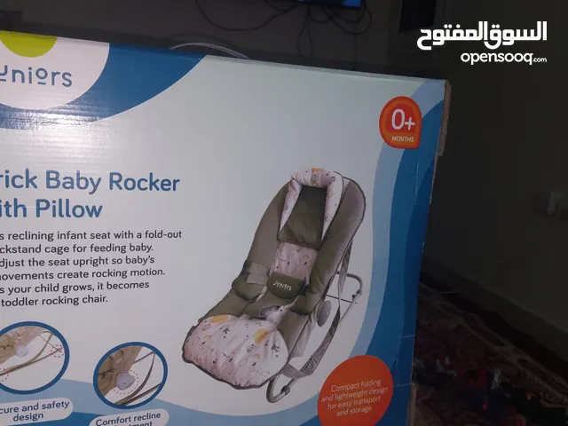 كرسي اطفال هزاز من جونيور باللون الرمادي جديد