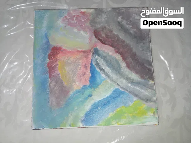 لوحة فنية باستخدام لوحات صغيرة وكبيرة