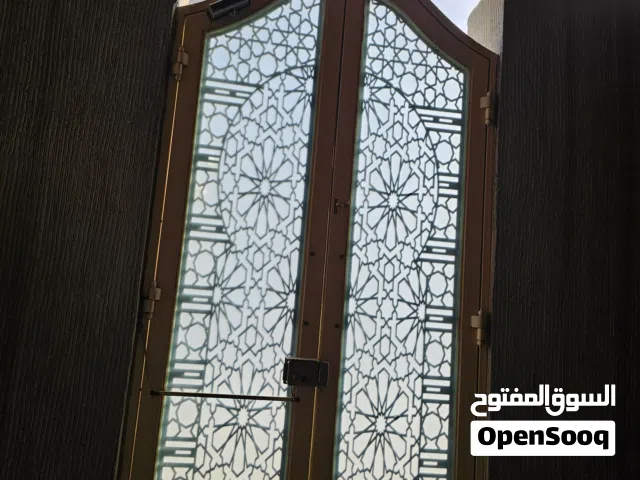 ثلاث أبواب خارجيه حديد مشغول