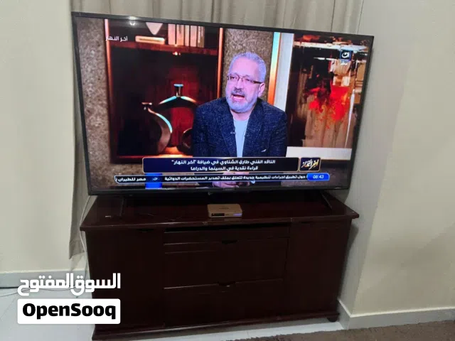 Sony 55 LED TV + Wooden TV Cabinet – Very Good Condition تلفزيون سوني 55 بوصة LED مع طاولة تلفزيون