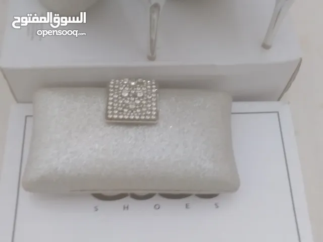 Silver With Heels in Tripoli