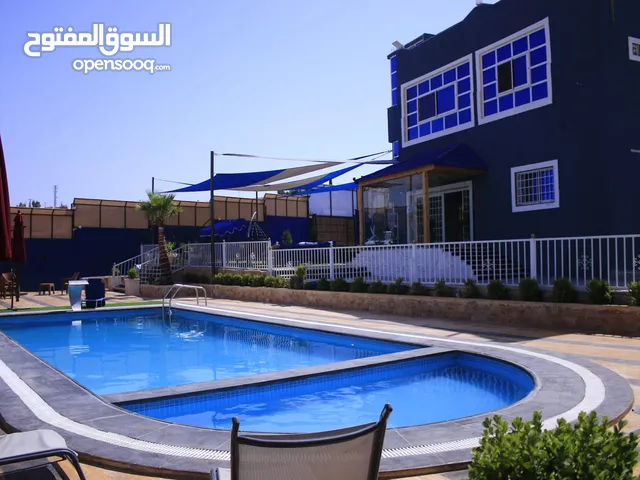 شاليه خرافي بسعر مغري في دخل شارع الزرقا جرش للاستثمار. منطقة شاليهات