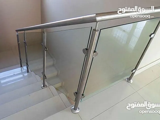 تركيب وتفصيل زجاج سيكوريت واجهات وابواب